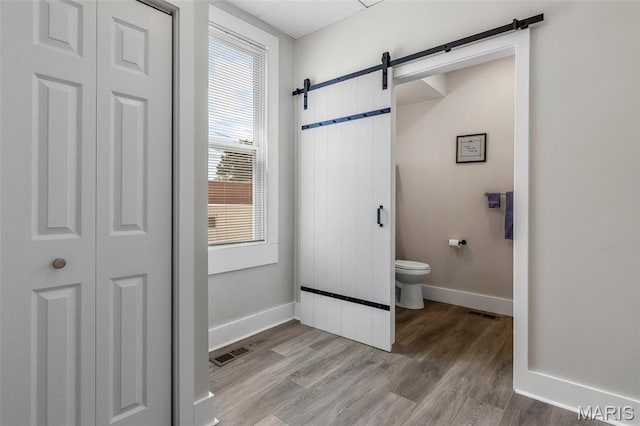 229 Broadway Ave, Crystal City, MO 63019 - bathroom featuring a closet and wood finished floors
