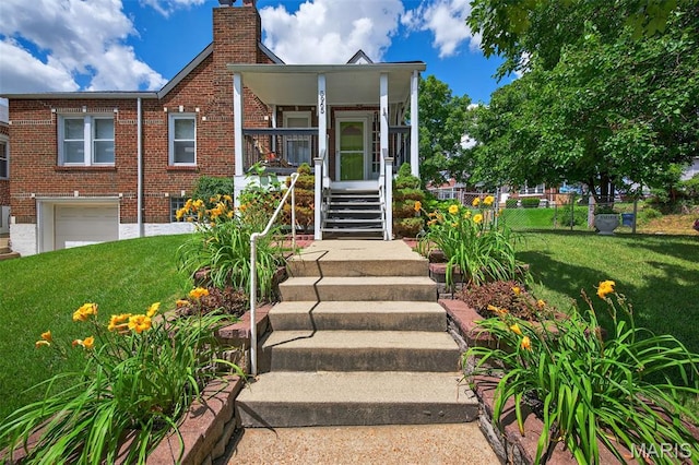 5965 S Cuba Ct, Saint Louis, MO 63139 - view of front of property featuring brick siding, a chimney, stairway, and covered porch