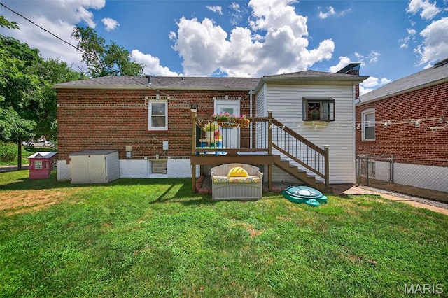 5965 S Cuba Ct, Saint Louis, MO 63139 - rear view of property featuring brick siding and a deck