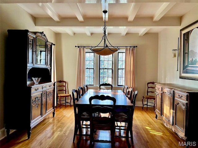 444 Algonquin Pl, Webster Groves, MO 63119 - dining space with light wood-style flooring and beam ceiling