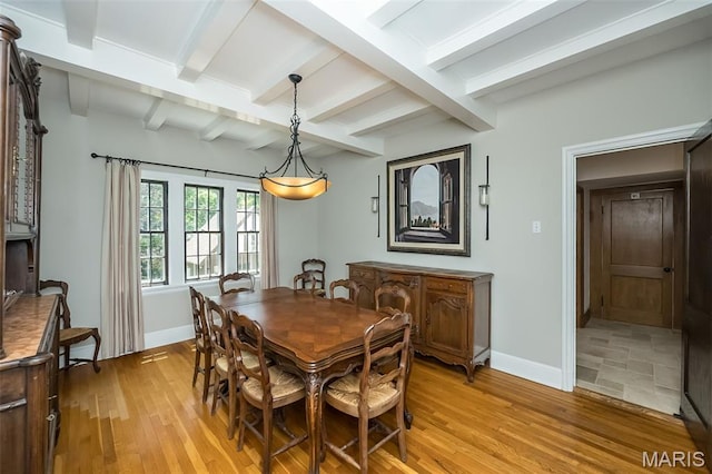 444 Algonquin Pl, Webster Groves, MO 63119 - dining space featuring light wood-style flooring and beam ceiling