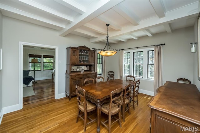 444 Algonquin Pl, Webster Groves, MO 63119 - dining area featuring light wood-type flooring and beamed ceiling