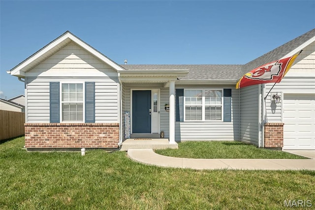 229 Essex Ct, Wright City, MO 63390 - ranch-style house with brick siding, an attached garage, a front yard, and roof with shingles