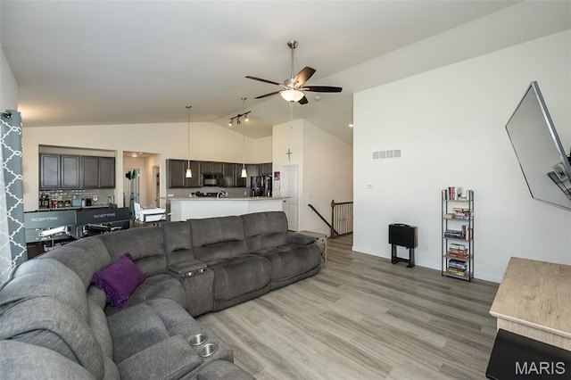 229 Essex Ct, Wright City, MO 63390 - living room featuring ceiling fan, light wood-style floors, and high vaulted ceiling