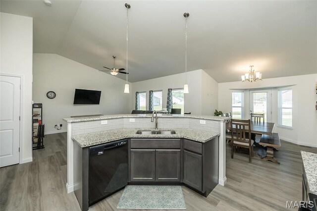 229 Essex Ct, Wright City, MO 63390 - kitchen featuring dishwasher, lofted ceiling, light wood-style flooring, a ceiling fan, and open floor plan