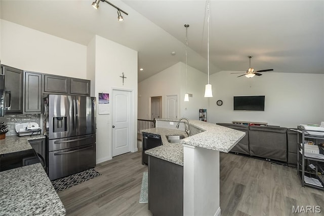 229 Essex Ct, Wright City, MO 63390 - kitchen featuring stainless steel refrigerator with ice dispenser, ceiling fan, lofted ceiling, open floor plan, and wood finished floors