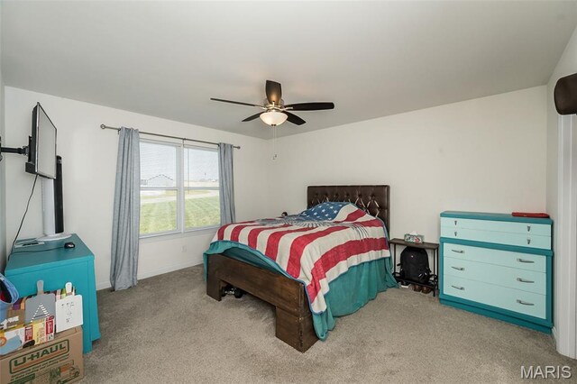 229 Essex Ct, Wright City, MO 63390 - carpeted bedroom with baseboards and a ceiling fan
