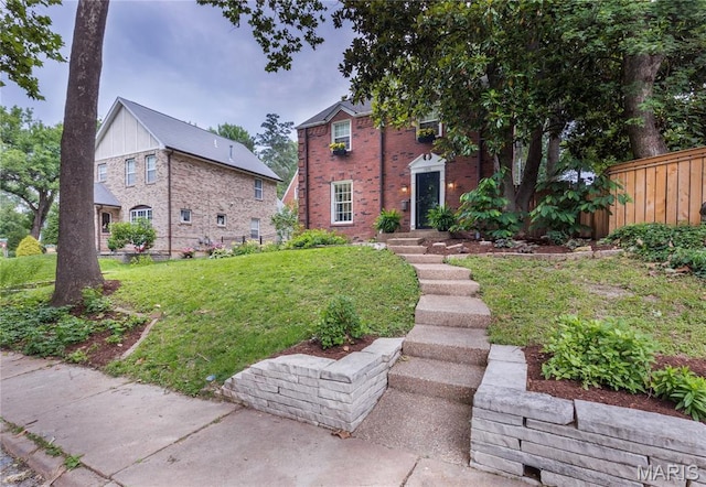 1076 N Jackson Ave, University City, MO 63130 - view of front of home featuring brick siding