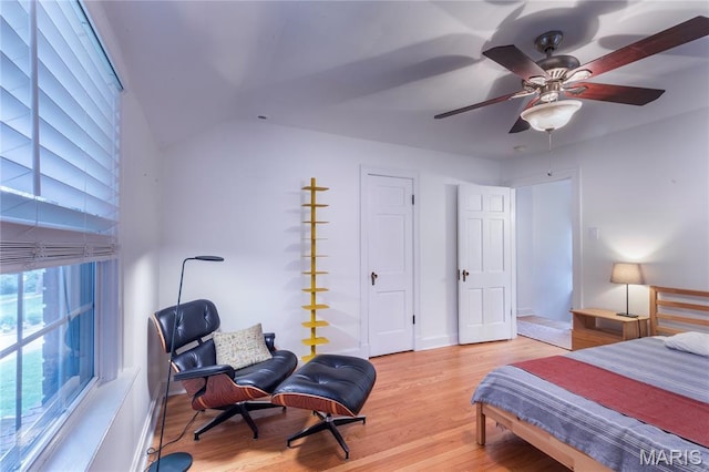 1076 N Jackson Ave, University City, MO 63130 - bedroom featuring light wood finished floors, ceiling fan, and vaulted ceiling