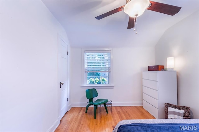 1076 N Jackson Ave, University City, MO 63130 - bedroom with vaulted ceiling, wood finished floors, and ceiling fan