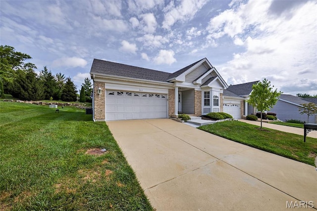 2417 S Lakeridge Ct Unit 14, Lake St Louis, MO 63367 - single story home featuring a garage, brick siding, concrete driveway, a front lawn, and roof with shingles