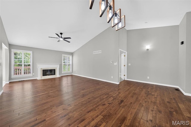 2417 S Lakeridge Ct Unit 14, Lake St Louis, MO 63367 - unfurnished living room with a ceiling fan, dark wood finished floors, a high end fireplace, and high vaulted ceiling