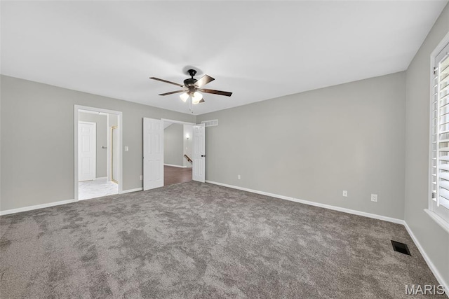 2417 S Lakeridge Ct Unit 14, Lake St Louis, MO 63367 - unfurnished bedroom featuring carpet floors and a ceiling fan