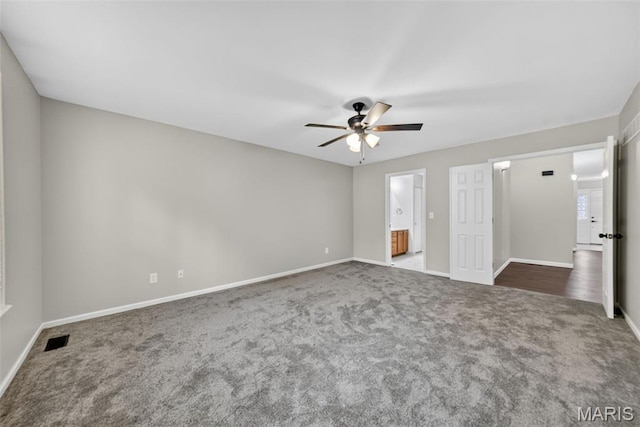 2417 S Lakeridge Ct Unit 14, Lake St Louis, MO 63367 - unfurnished bedroom featuring carpet, a ceiling fan, and ensuite bathroom