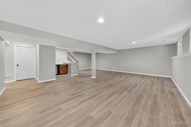 2417 S Lakeridge Ct Unit 14, Lake St Louis, MO 63367 - finished below grade area featuring light wood-style floors and recessed lighting