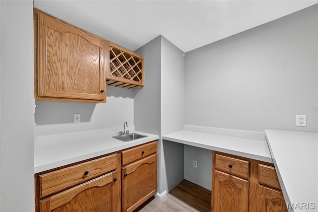 2417 S Lakeridge Ct Unit 14, Lake St Louis, MO 63367 - kitchen featuring light wood-style floors and light countertops