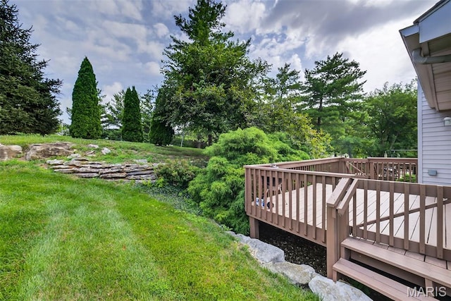 2417 S Lakeridge Ct Unit 14, Lake St Louis, MO 63367 - view of grassy yard with a deck and view of scattered trees