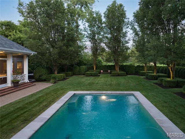 10420 Litzsinger Rd, Frontenac, MO 63131 - swimming pool featuring a lawn and view of wooded area