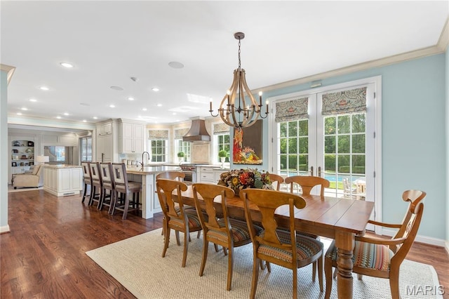 10420 Litzsinger Rd, Frontenac, MO 63131 - dining room with crown molding, plenty of natural light, a chandelier, dark wood-style flooring, and recessed lighting