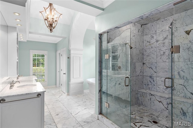 10420 Litzsinger Rd, Frontenac, MO 63131 - bathroom with double vanity, a freestanding tub, a marble finish shower, marble finish floors, and recessed lighting