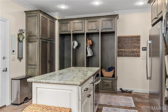 10420 Litzsinger Rd, Frontenac, MO 63131 - mudroom with ornamental molding, stone finish flooring, and recessed lighting