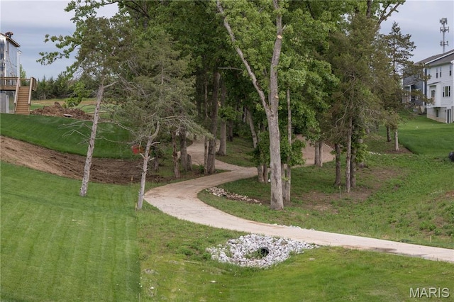 104 Bell Blvd, Wentzville, MO 63385 - view of home's community featuring a lawn and stairs