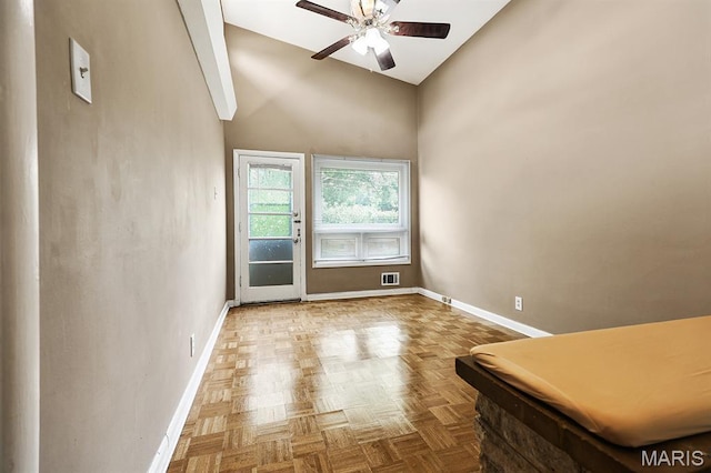 7944 Westover Pl, University City, MO 63130 - empty room featuring a ceiling fan and high vaulted ceiling
