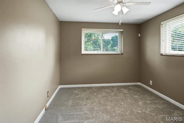 7944 Westover Pl, University City, MO 63130 - carpeted empty room featuring a ceiling fan and baseboards