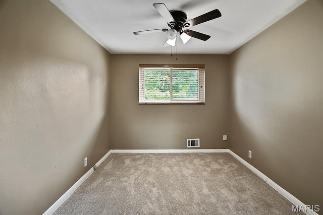 7944 Westover Pl, University City, MO 63130 - unfurnished room with carpet flooring and a ceiling fan