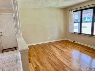 2301 Arkansas Dr, High Ridge, MO 63049 - unfurnished room featuring baseboards and wood finished floors