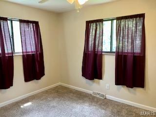 2301 Arkansas Dr, High Ridge, MO 63049 - carpeted empty room with a ceiling fan and baseboards