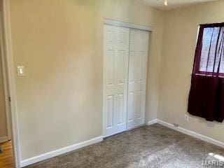 2301 Arkansas Dr, High Ridge, MO 63049 - unfurnished bedroom with a closet and carpet flooring