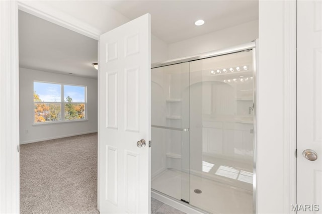 347 Heather Mill Dr, Wentzville, MO 63385 - bathroom featuring a stall shower and recessed lighting