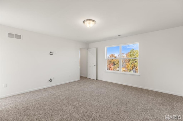 347 Heather Mill Dr, Wentzville, MO 63385 - carpeted empty room with baseboards