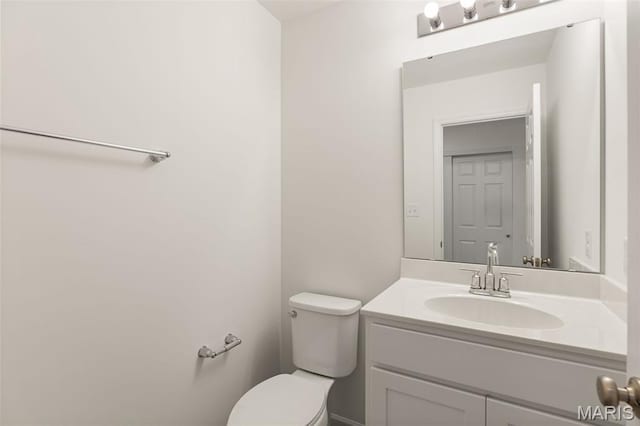 347 Heather Mill Dr, Wentzville, MO 63385 - half bathroom featuring toilet and vanity