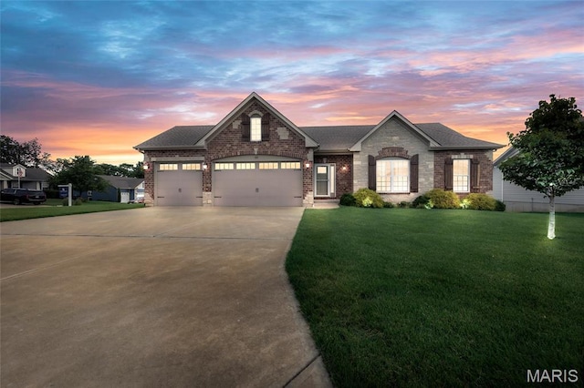 222 Austin Oaks Dr, Moscow Mills, MO 63362 - view of front facade with driveway, brick siding, a front yard, and roof with shingles