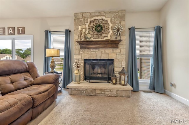 222 Austin Oaks Dr, Moscow Mills, MO 63362 - living room with carpet floors and a stone fireplace