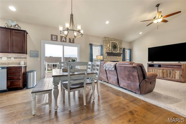 222 Austin Oaks Dr, Moscow Mills, MO 63362 - dining area with lofted ceiling, a chandelier, light wood-style flooring, recessed lighting, and ceiling fan
