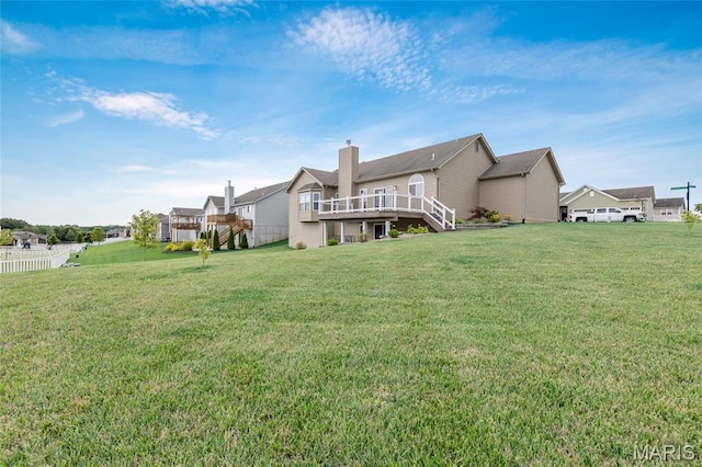 222 Austin Oaks Dr, Moscow Mills, MO 63362 - back of house featuring a deck, stairway, a yard, and a chimney