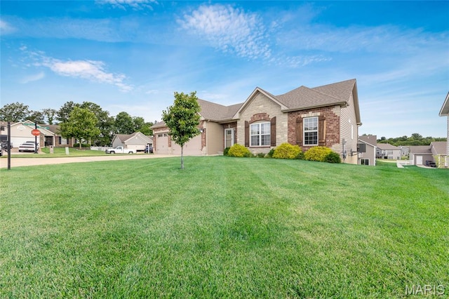 222 Austin Oaks Dr, Moscow Mills, MO 63362 - single story home featuring concrete driveway, an attached garage, brick siding, a front yard, and roof with shingles