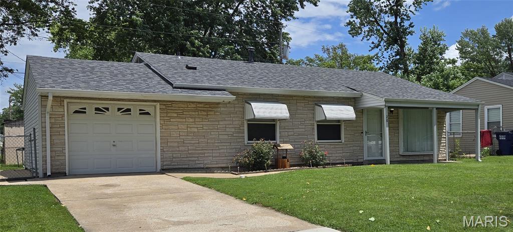 28 Steeplechase Dr, Saint Peters, MO 63376 - single story home with an attached garage, stone siding, a shingled roof, and driveway