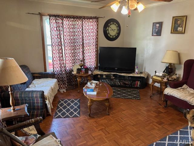 929 Lake St, Sikeston, MO 63801 - living room featuring ornamental molding and ceiling fan