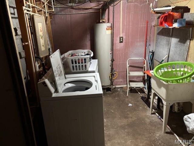 929 Lake St, Sikeston, MO 63801 - laundry room featuring water heater and washing machine and dryer