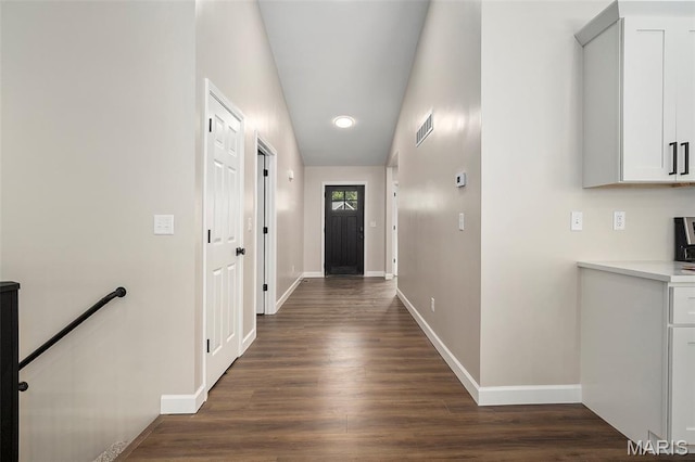 684 Fox Creek Dr, Fenton, MO 63026 - hallway featuring dark wood-style floors and an upstairs landing