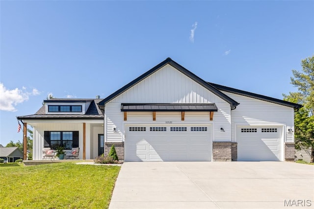 10523 Village Ln, Foristell, MO 63348 - modern inspired farmhouse with a standing seam roof, a garage, driveway, and board and batten siding