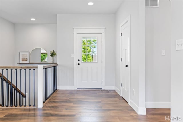 10523 Village Ln, Foristell, MO 63348 - entrance foyer with wood finished floors and recessed lighting