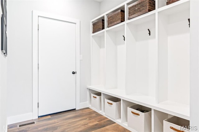 10523 Village Ln, Foristell, MO 63348 - mudroom featuring wood finished floors and baseboards