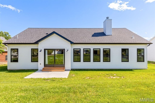 10523 Village Ln, Foristell, MO 63348 - rear view of property with a chimney, a yard, roof with shingles, and entry steps