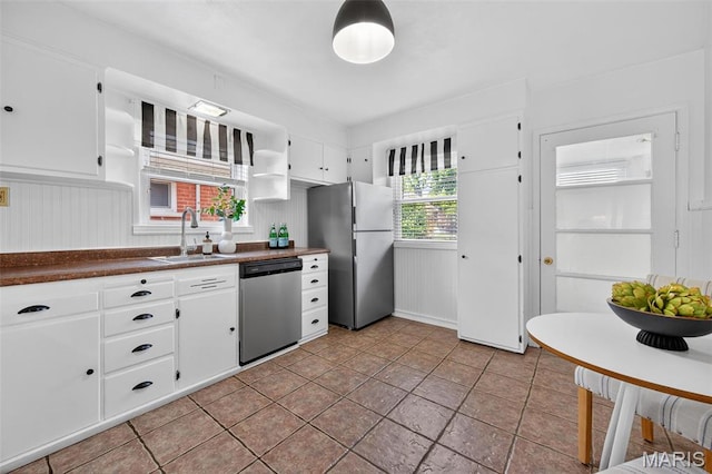 5021 Hi View Ave, Shrewsbury, MO 63119 - kitchen featuring stainless steel appliances, dark countertops, white cabinets, and open shelves
