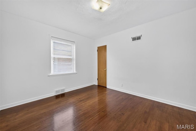 5021 Hi View Ave, Shrewsbury, MO 63119 - empty room with wood finished floors and baseboards